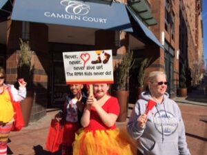 girl holding sign