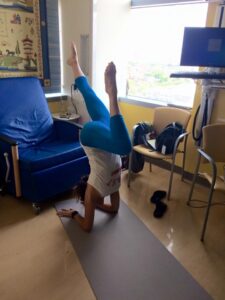 marty doing yoga in room